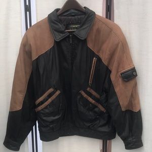 Leather jacket by  Winlit Size Large Black and Tan . 5 pockets zipper front